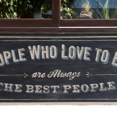 Wooden panels handmade painted with old school lettering for Sausalito Restaurant in Costa Teguise - Lanzarote: "People who love to eat are always the best people" - Jardin del Mar